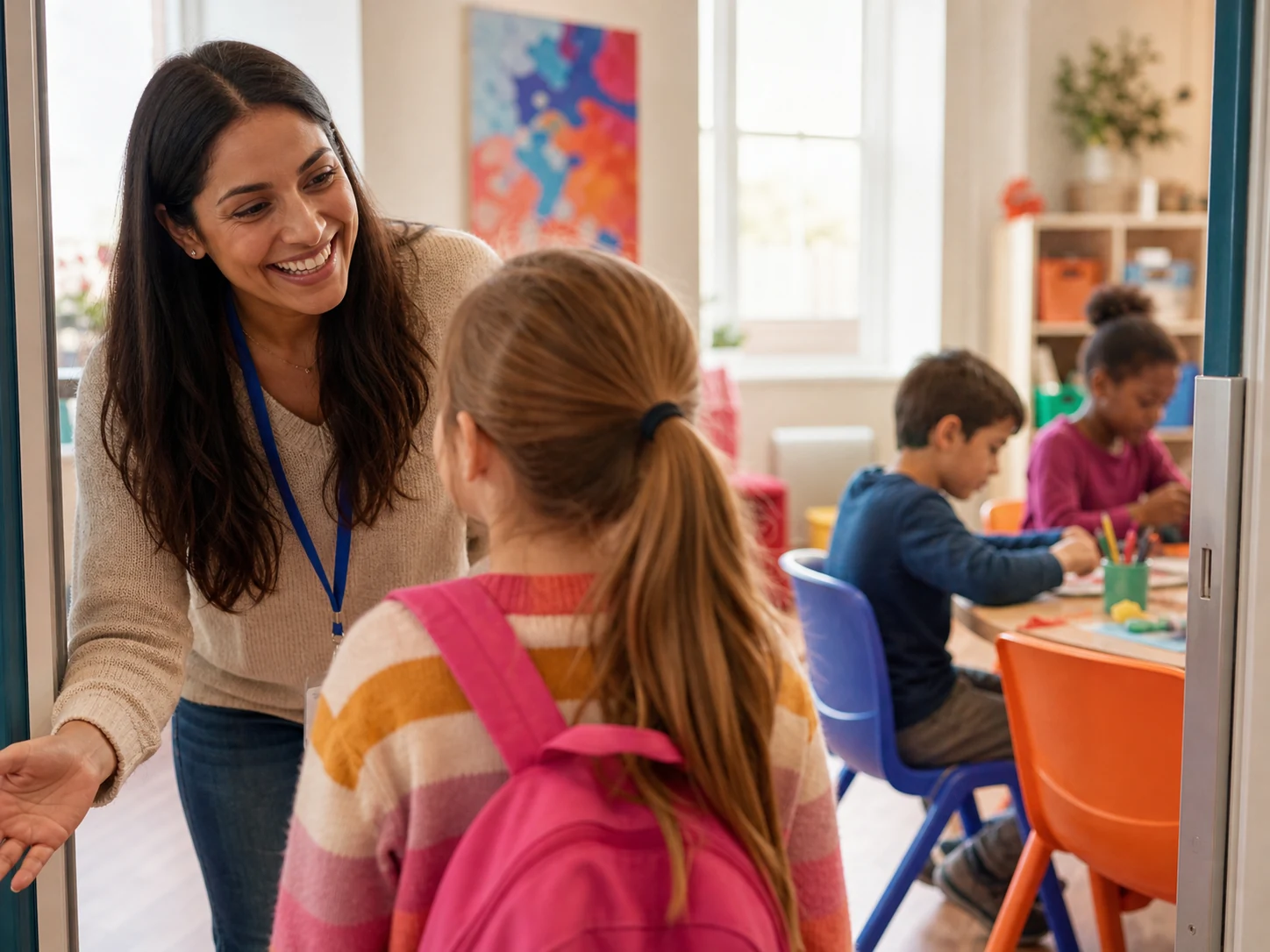 A club facilitator warmly welcoming a child into the activity room