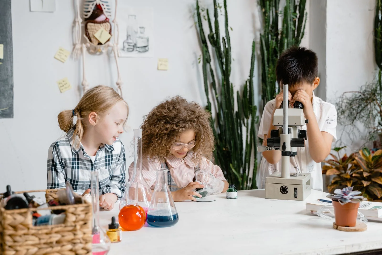 Children investigating with a microscope during a science activity